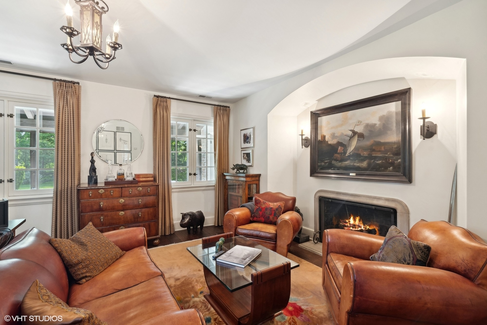 885 Maplewood Road Lake Forest, IL 60045 - Photo 27 of 78 a living room with furniture a fireplace and a large window