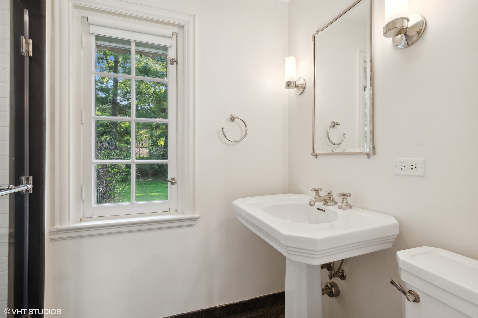 885 Maplewood Road Lake Forest, IL 60045 - Photo 30 of 78 a bathroom with a sink a toilet and a window