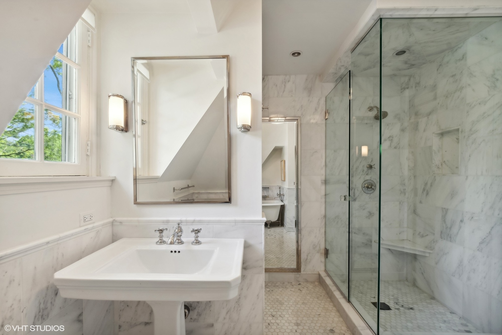 885 Maplewood Road Lake Forest, IL 60045 - Photo 44 of 78 a bathroom with a sink a mirror and shower