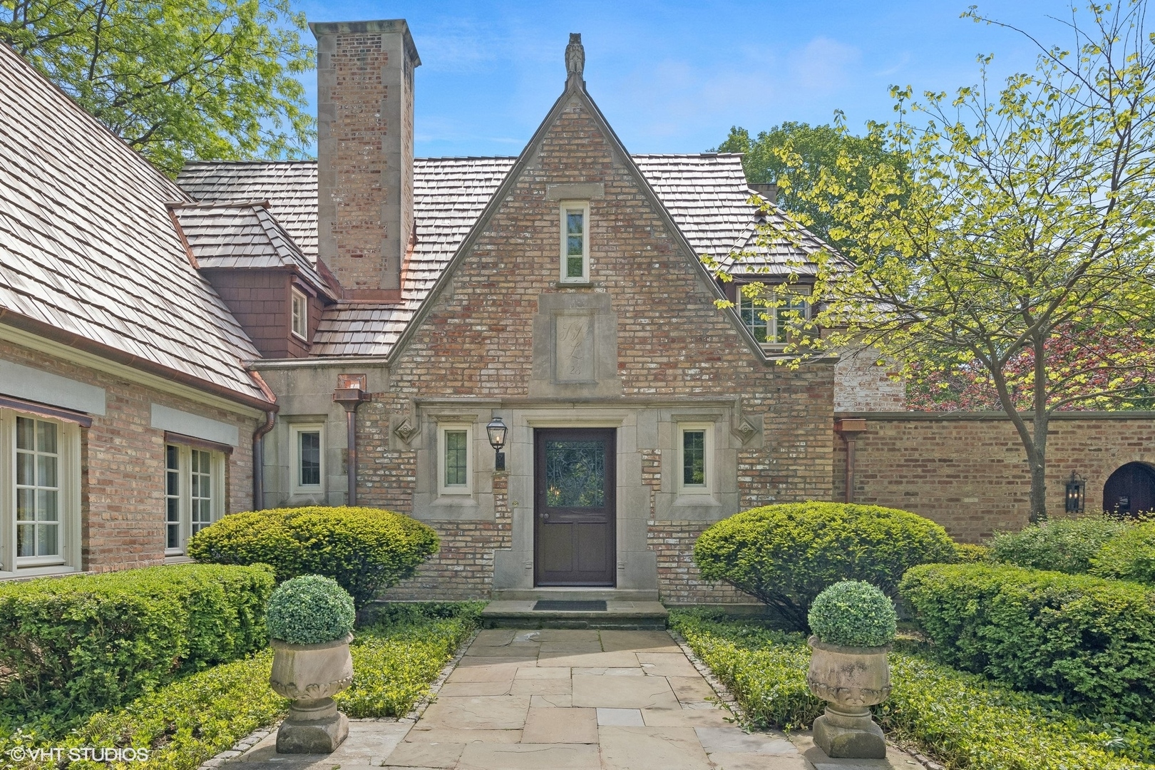 885 Maplewood Road Lake Forest, IL 60045 - Photo 46 of 78 a front view of a house with garden