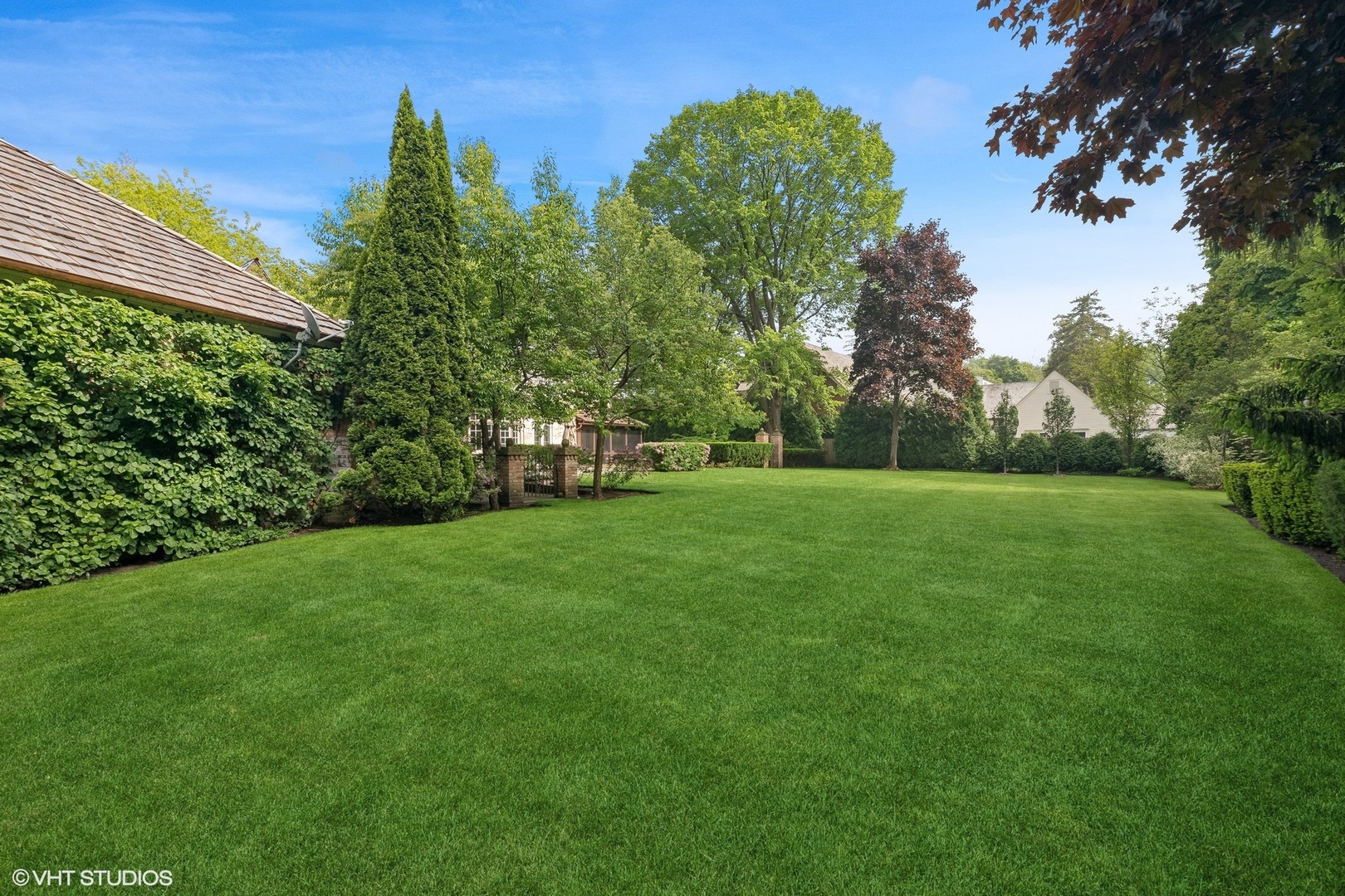 885 Maplewood Road Lake Forest, IL 60045 - Photo 55 of 78 a view of green field with trees in the background