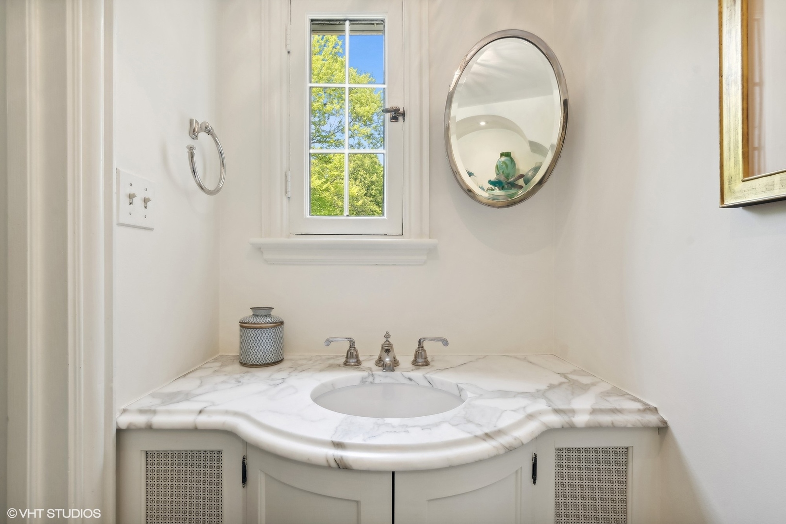 885 Maplewood Road Lake Forest, IL 60045 - Photo 6 of 78 a bathroom with a sink and a mirror