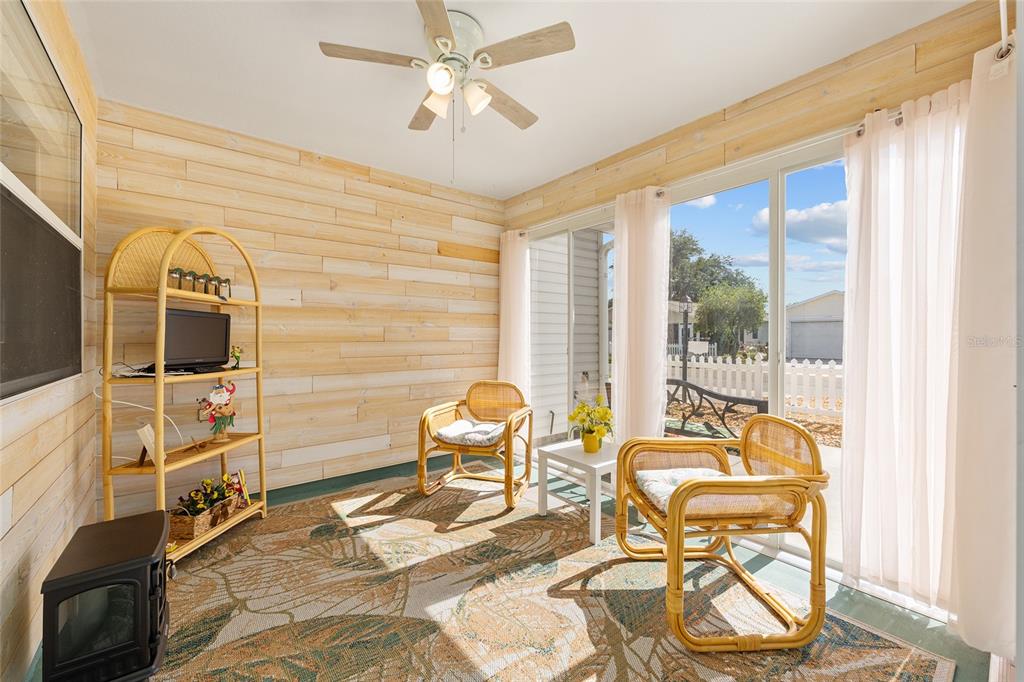 1710 Rosales Road The Villages, FL 32162 - Photo 18 of 23 a view of a dining room with furniture and a window