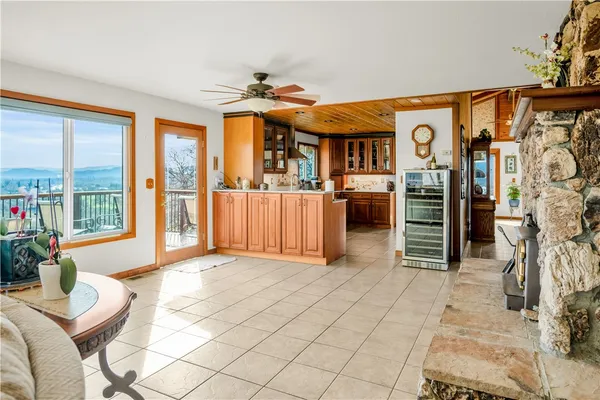 a view of a livingroom with furniture and windows