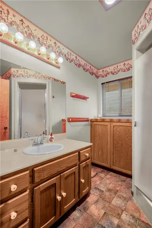 a utility room with sink dryer and washer