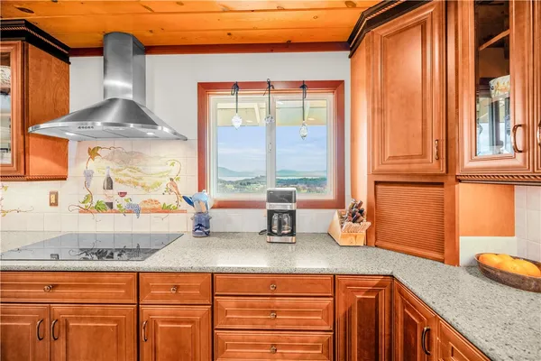 a kitchen with a sink and a window
