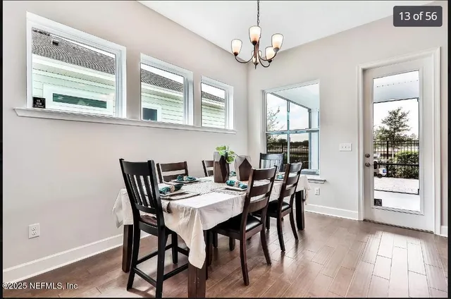 a living room with a bed and a window