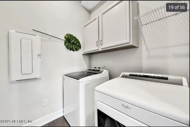 a bathroom with a sink toilet and a mirror