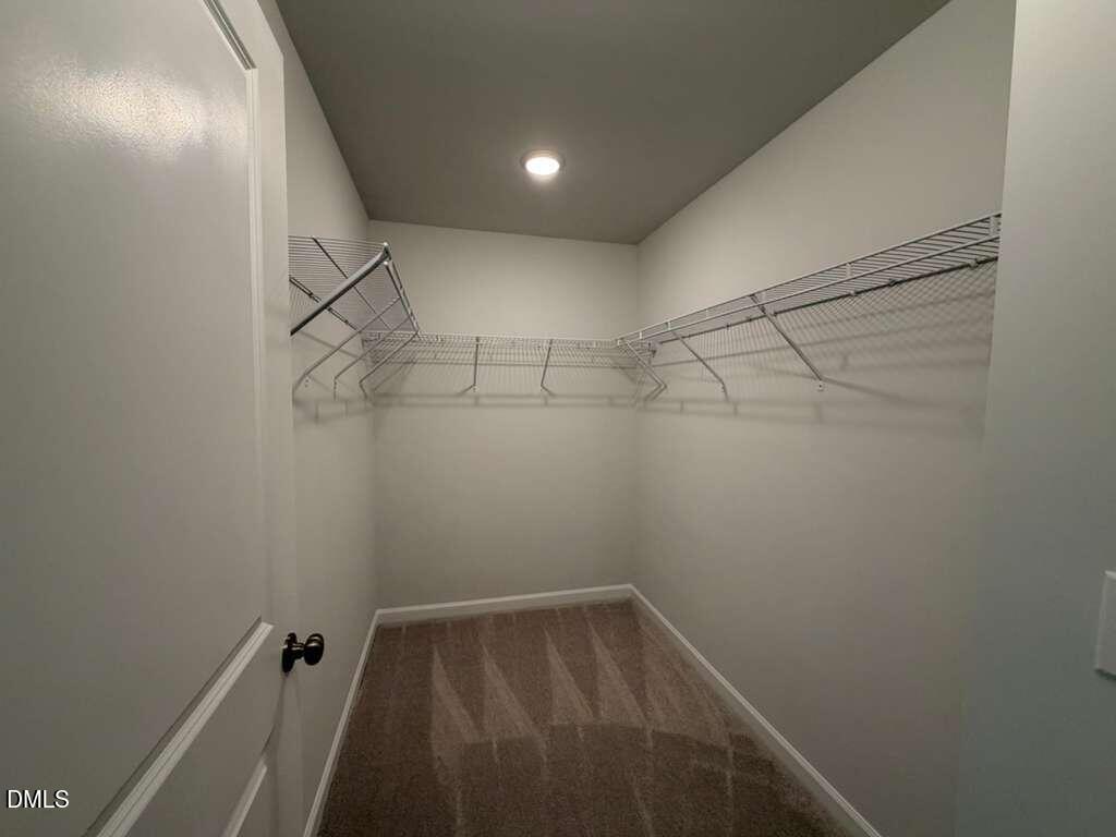 5024 Reader Way Durham, NC 27703 - Photo 20 of 26 a view of a room with racks on the wall