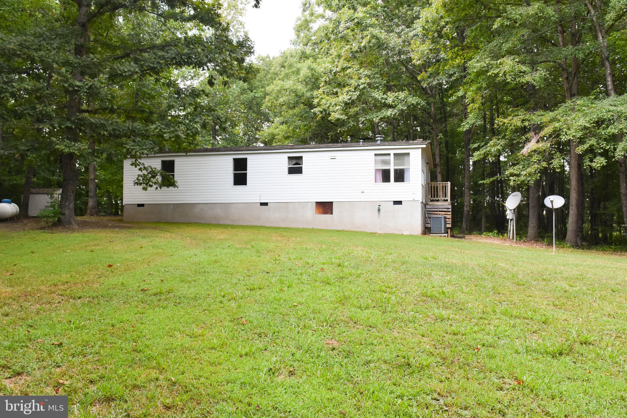 10000 Wallers Road Partlow, VA 22534 - Photo 2 of 15 a house view with a outdoor space