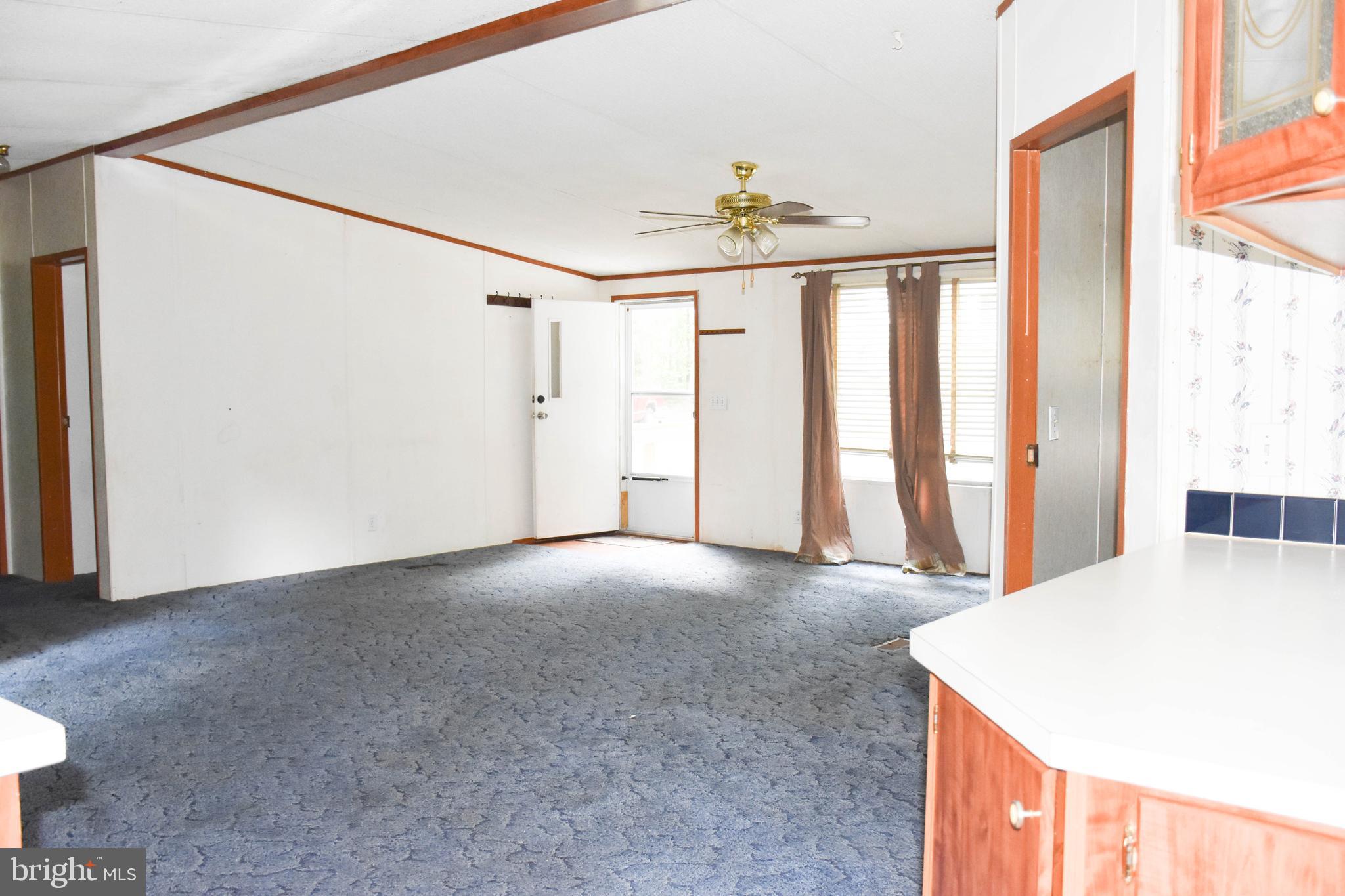 10000 Wallers Road Partlow, VA 22534 - Photo 4 of 15 a view of an empty room with a window