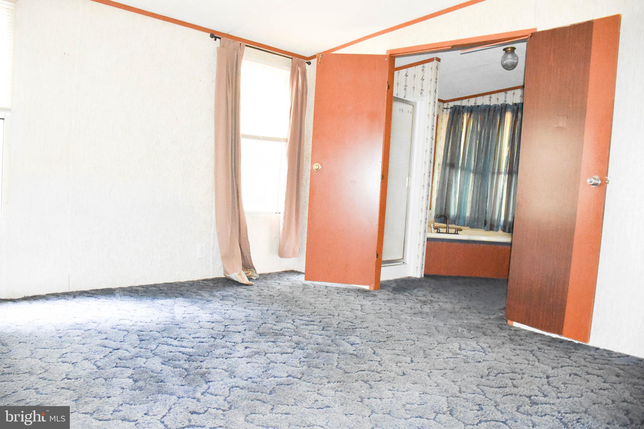 10000 Wallers Road Partlow, VA 22534 - Photo 8 of 15 an empty room with window