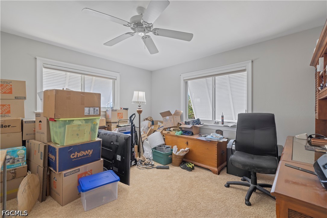 485 Peachtree Road Sanibel, FL 33957 - Photo 8 of 24 a work room with furniture and a window
