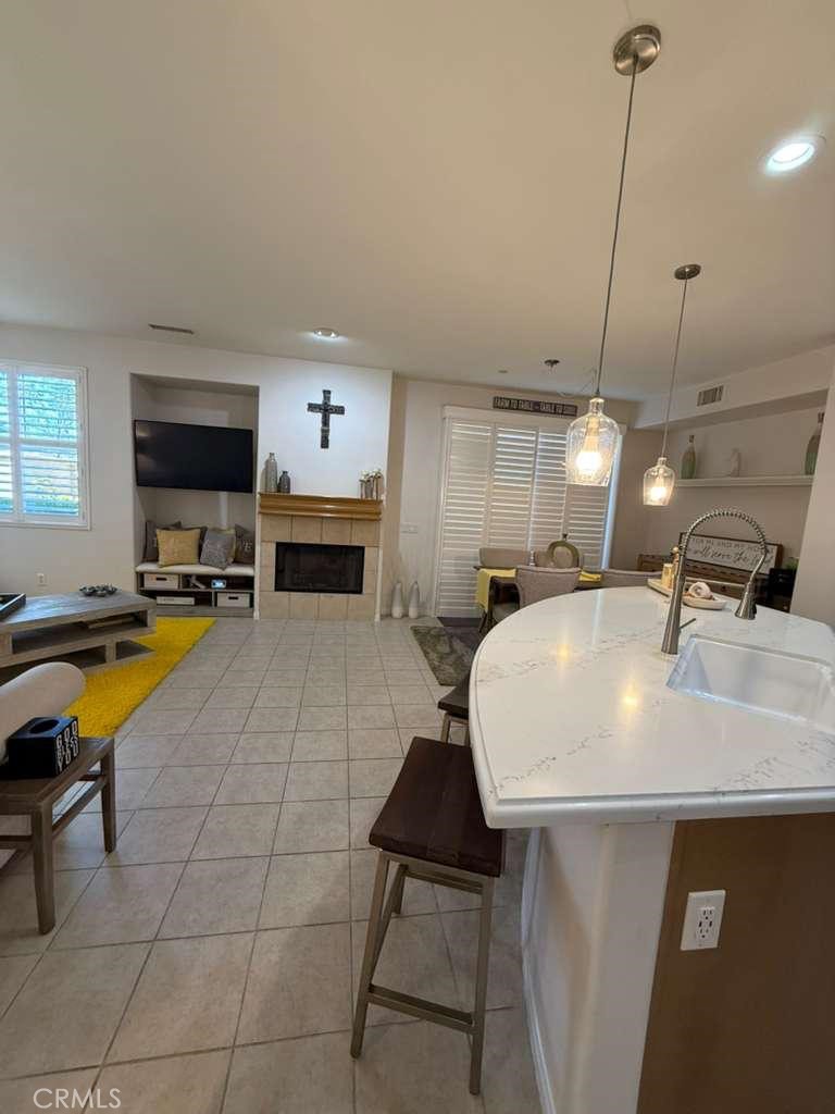 2931 Esperanza Way, Unit B Simi Valley, CA 93063 - Photo 13 of 49 a kitchen with a sink a counter top space cabinets and stainless steel appliances