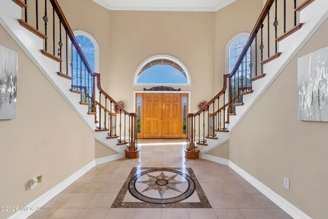 a view of a backyard of the house