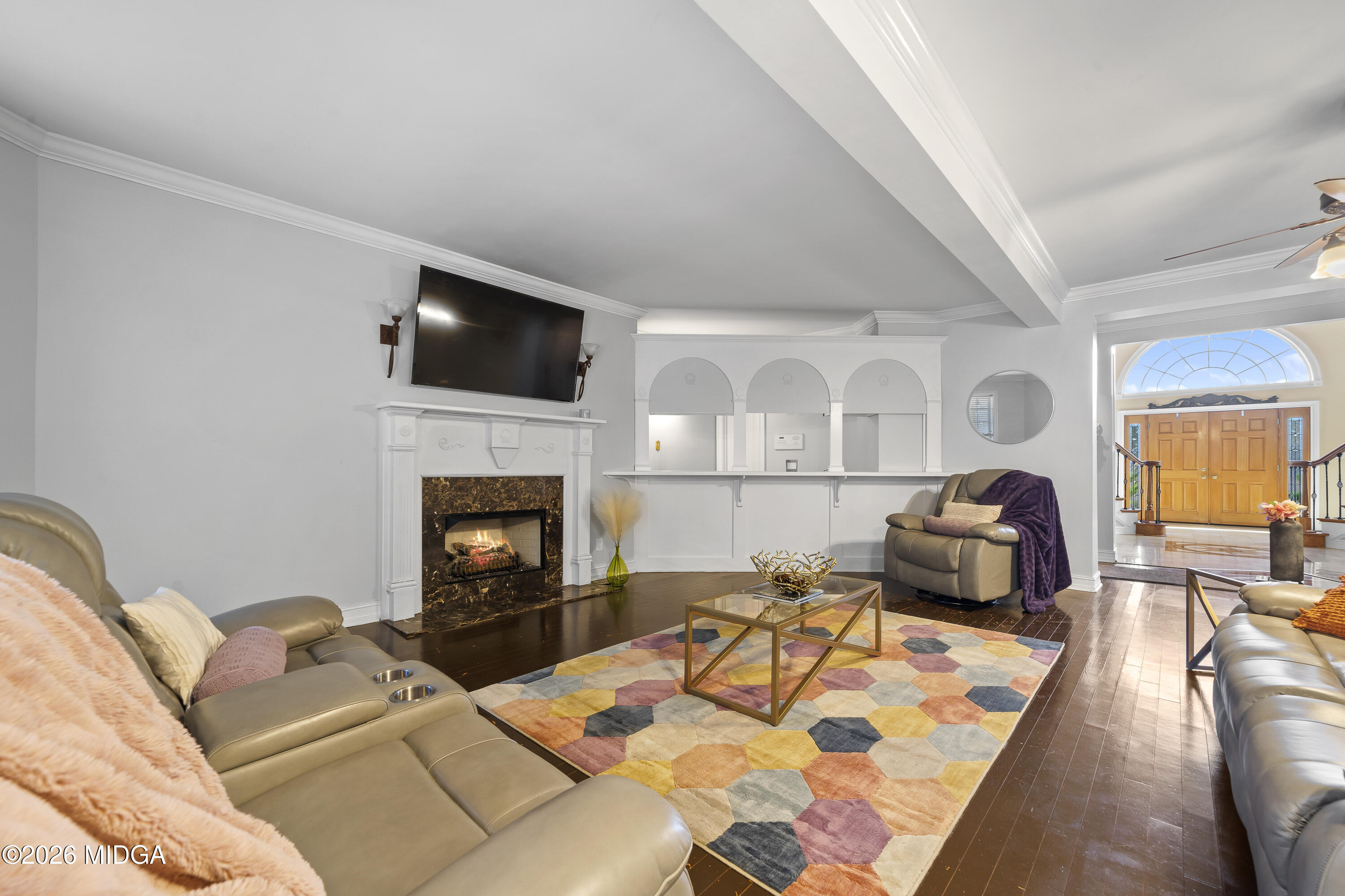 354 Lite-N-Tie Road Gray, GA 31032 - Photo 23 of 110 a living room with furniture and a fireplace