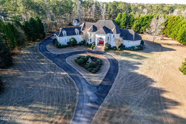 an aerial view of residential house with outdoor space