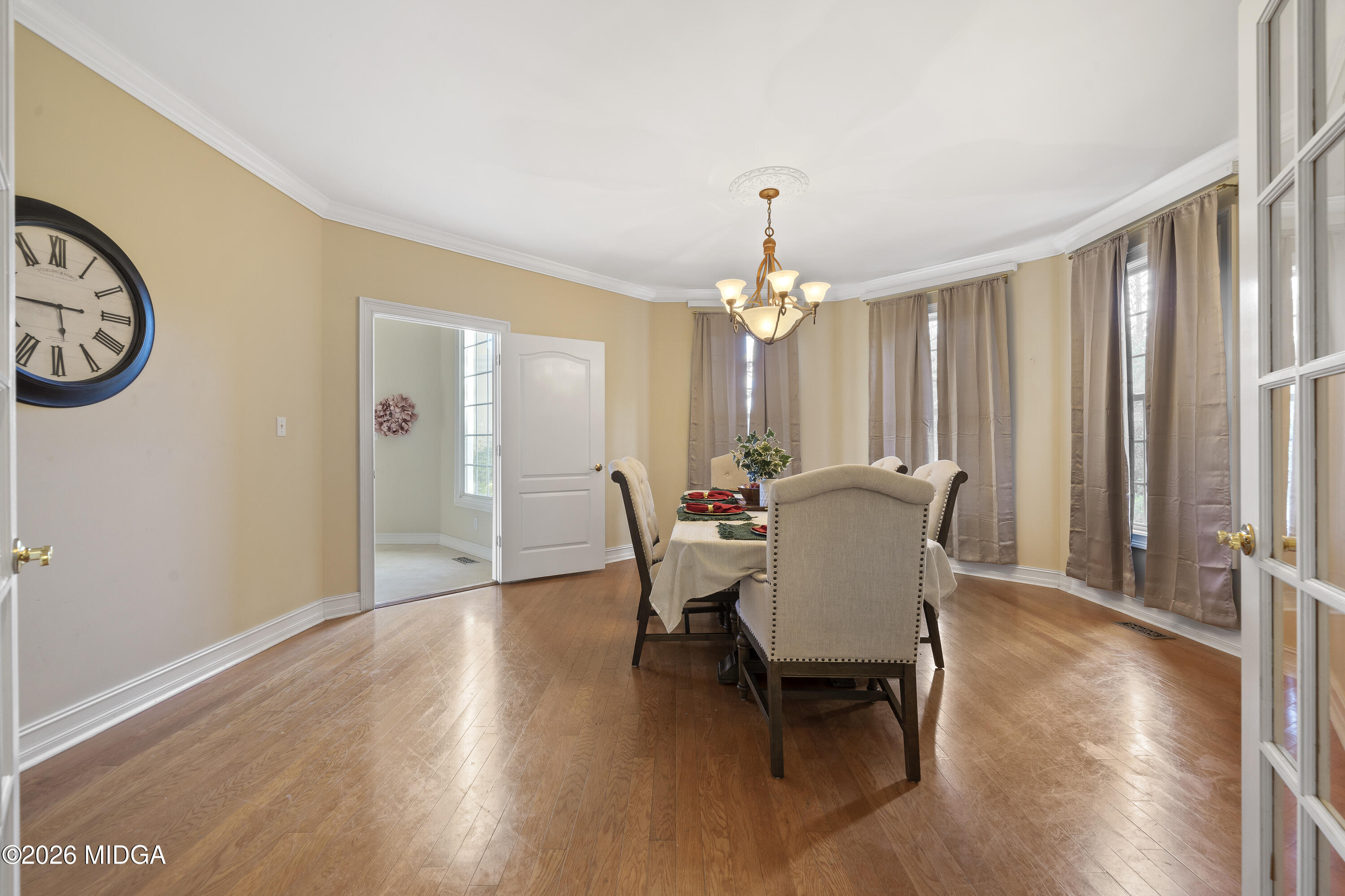 354 Lite-N-Tie Road Gray, GA 31032 - Photo 34 of 110 a view of a dining room with furniture window and wooden floor