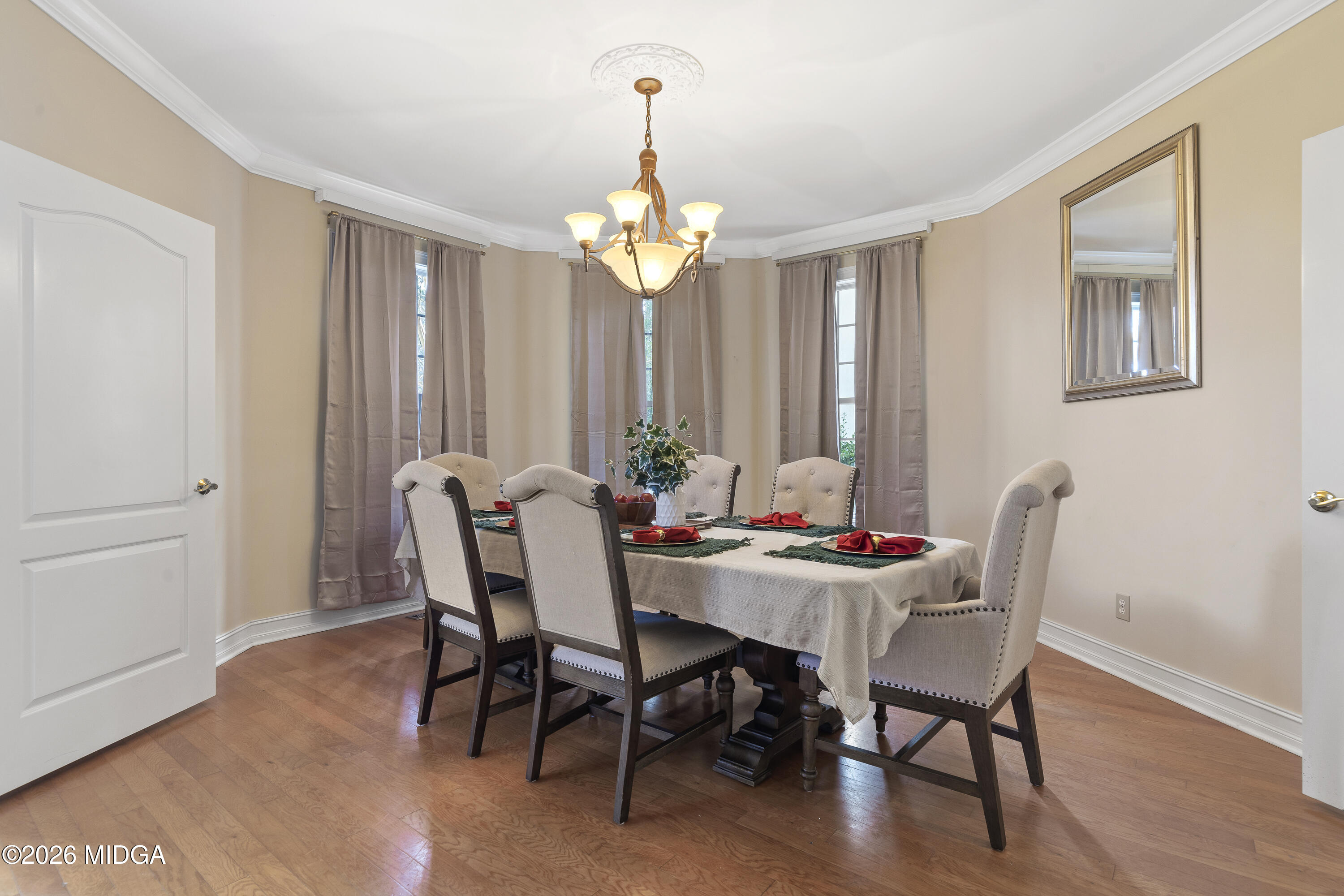 354 Lite-N-Tie Road Gray, GA 31032 - Photo 36 of 110 a view of a dining room with furniture window and wooden floor