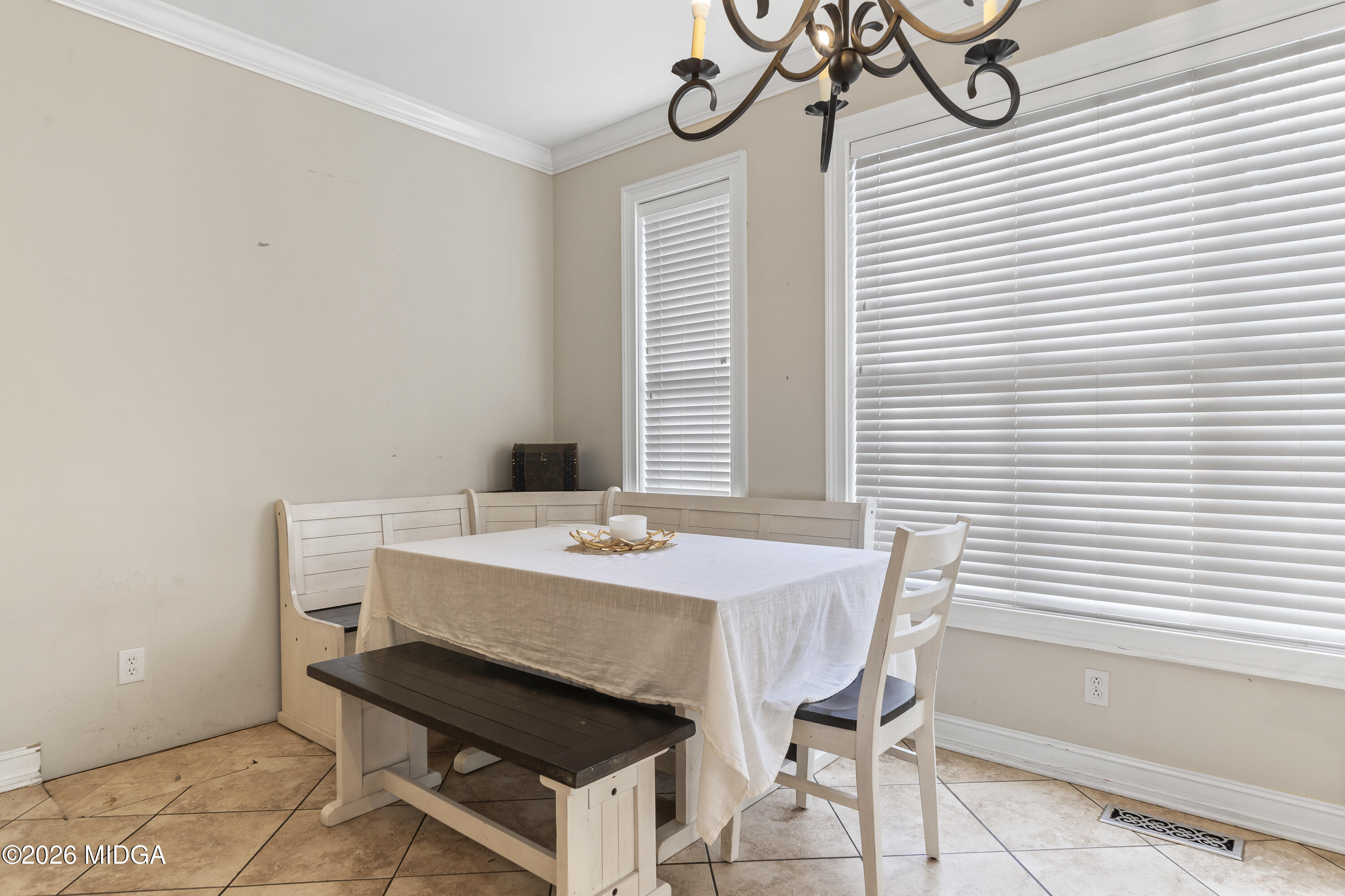 354 Lite-N-Tie Road Gray, GA 31032 - Photo 37 of 110 a dining room with a table and chairs
