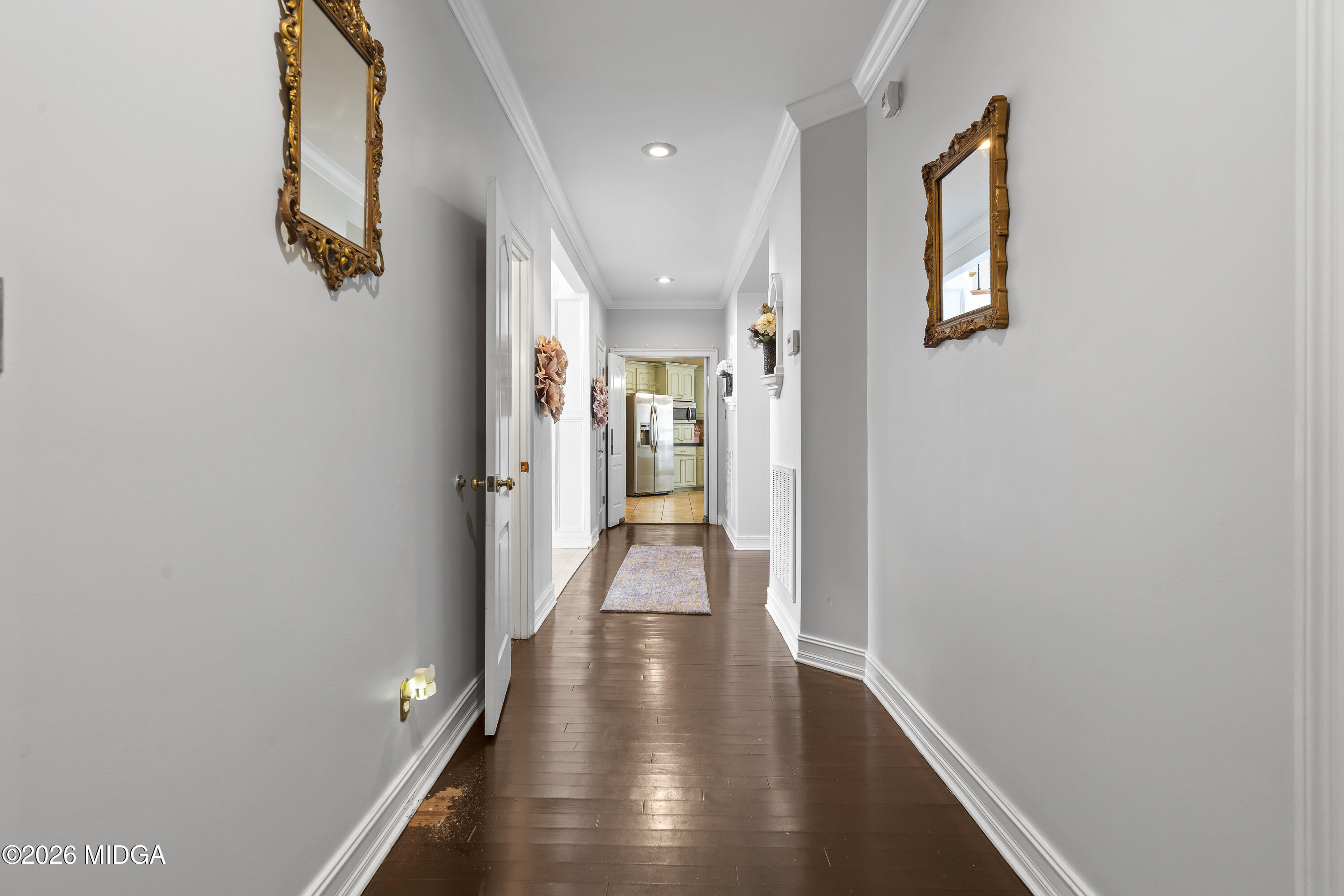 354 Lite-N-Tie Road Gray, GA 31032 - Photo 44 of 110 a view of a hallway with wooden floor