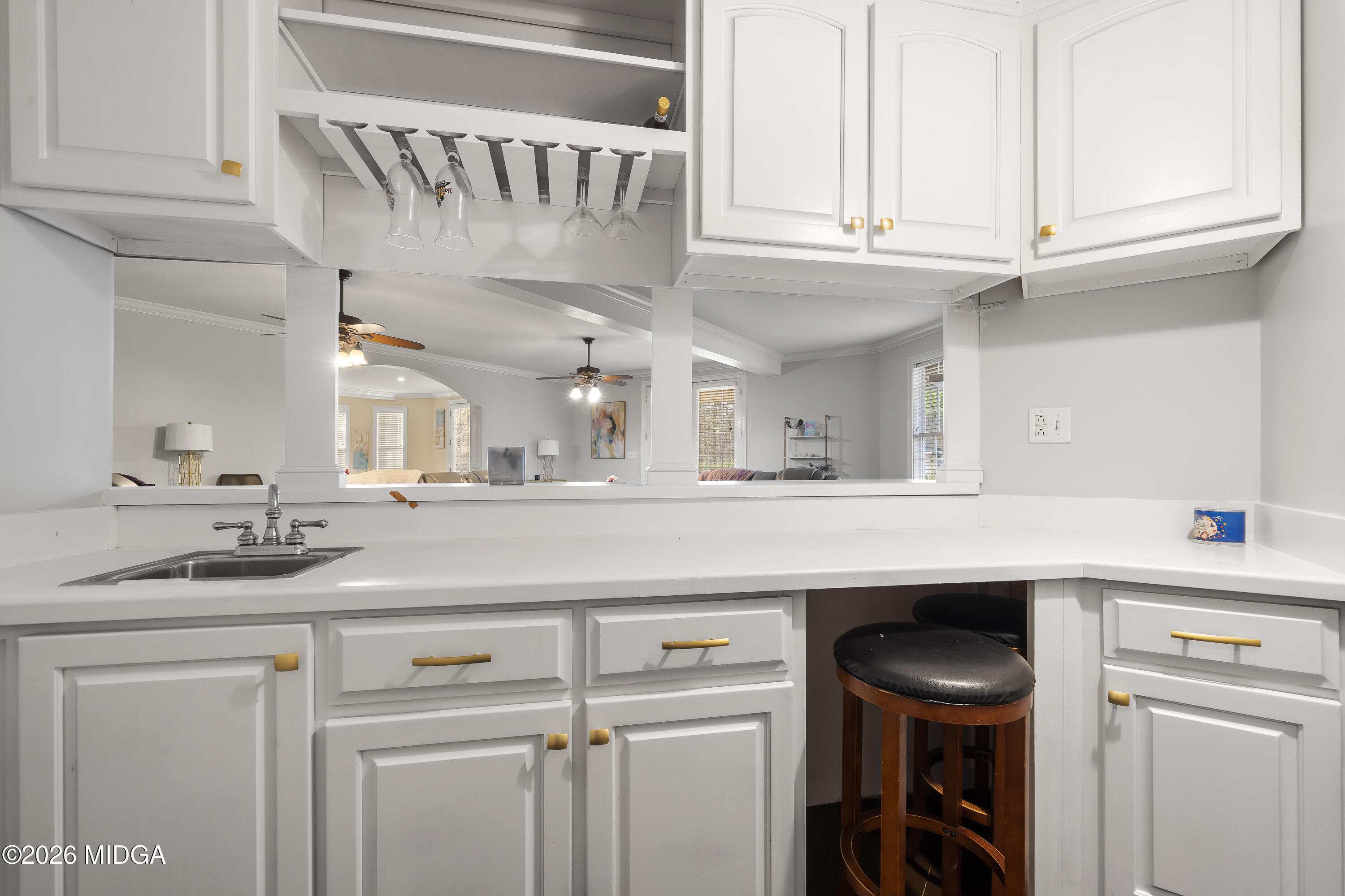 354 Lite-N-Tie Road Gray, GA 31032 - Photo 45 of 110 a kitchen with a sink and a refrigerator