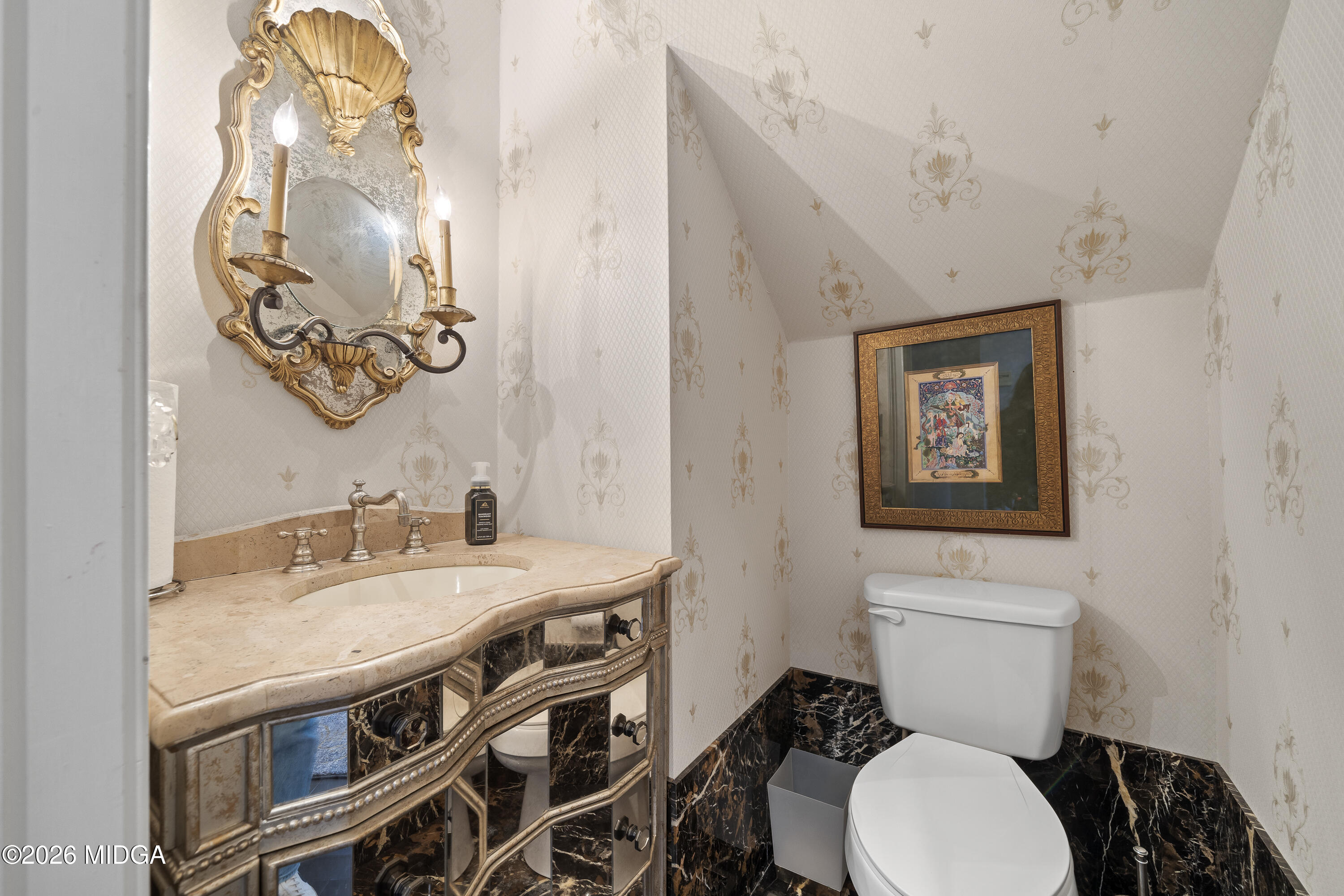 354 Lite-N-Tie Road Gray, GA 31032 - Photo 46 of 110 a bathroom with a sink a toilet and mirror