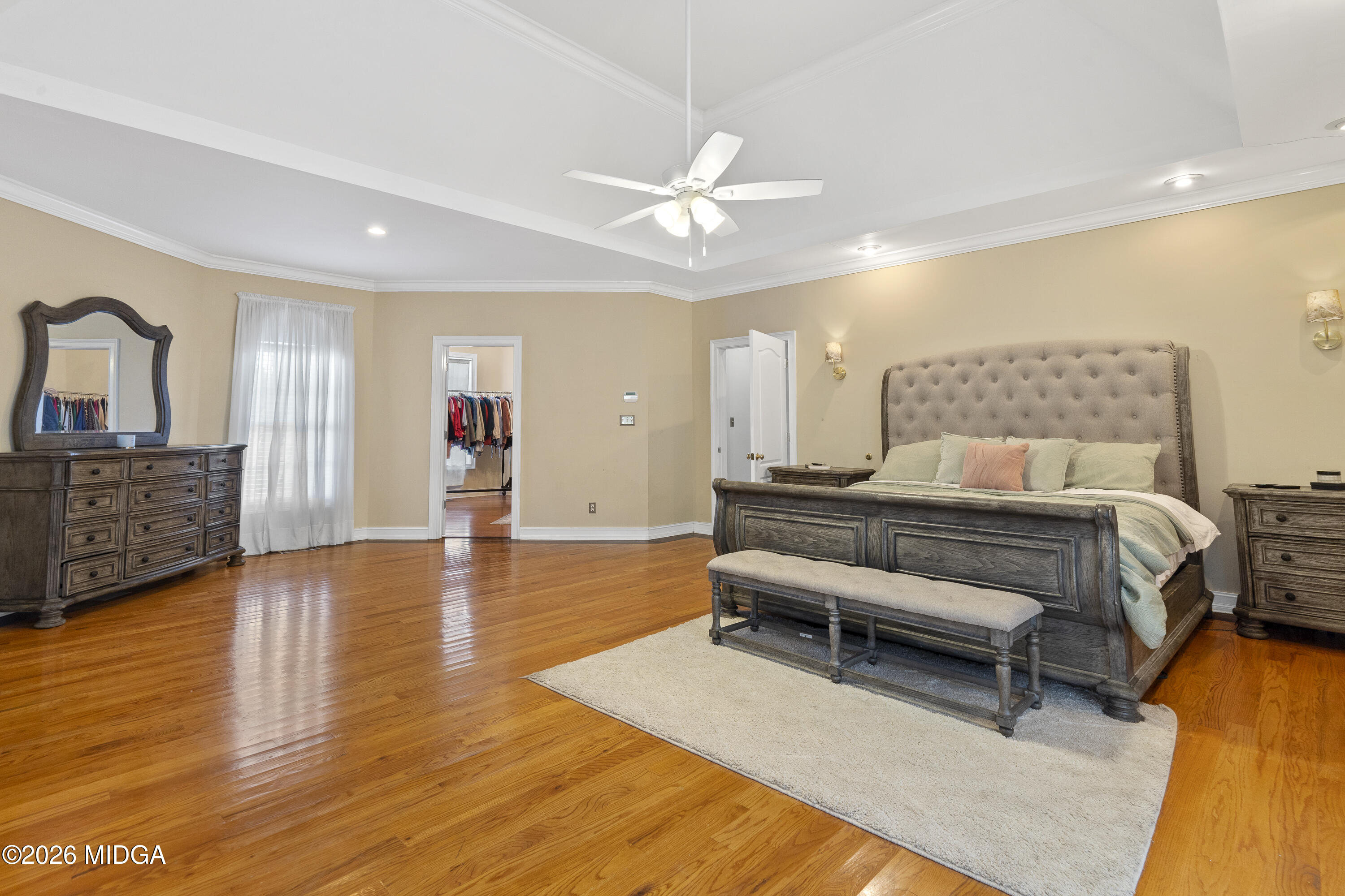 354 Lite-N-Tie Road Gray, GA 31032 - Photo 50 of 110 a bedroom with furniture and a wooden floor