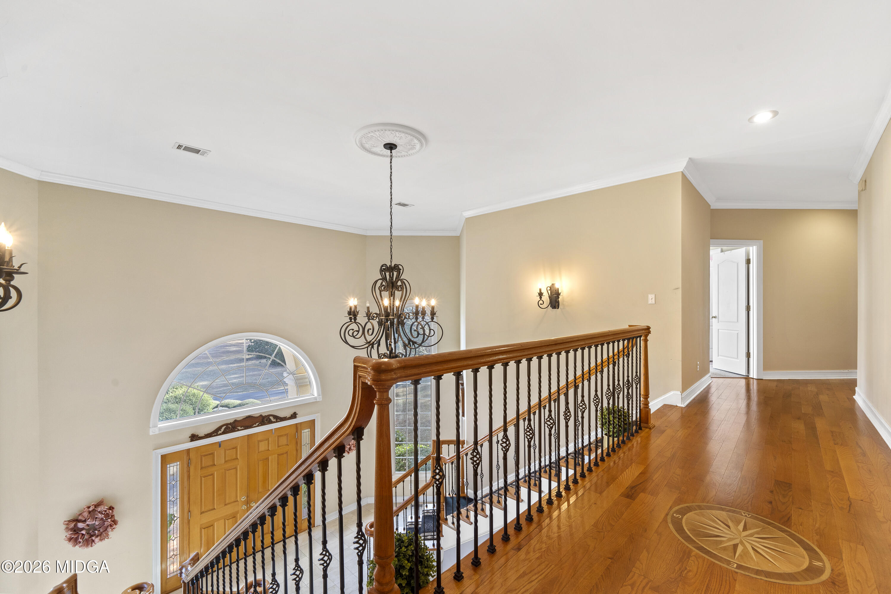 354 Lite-N-Tie Road Gray, GA 31032 - Photo 61 of 110 a view of a livingroom with furniture wooden floor windows and a chandelier