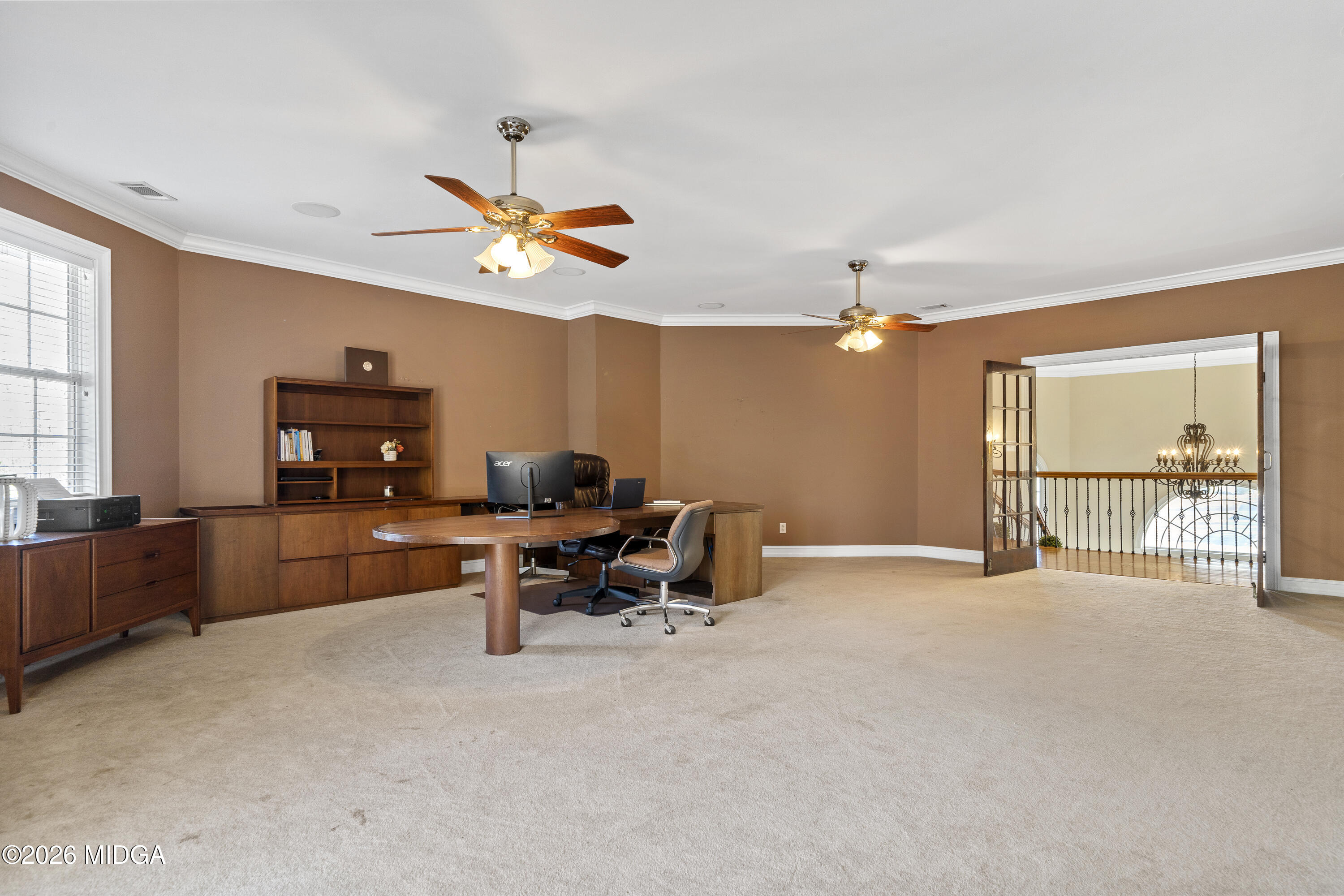 354 Lite-N-Tie Road Gray, GA 31032 - Photo 67 of 110 a view of a livingroom with furniture and a flat screen tv