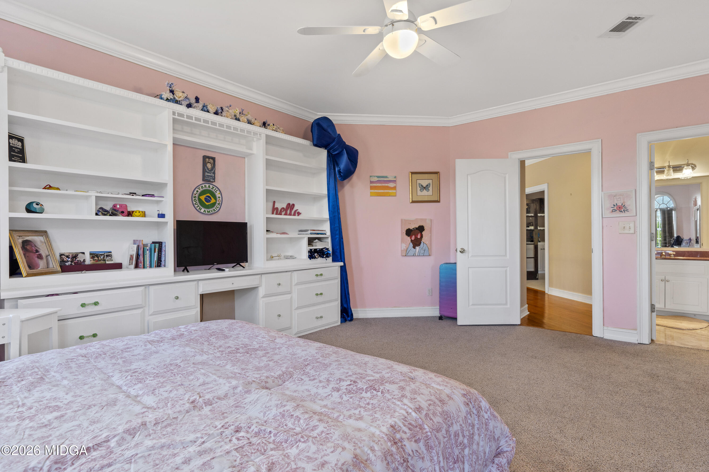 354 Lite-N-Tie Road Gray, GA 31032 - Photo 70 of 110 a bedroom with a bed and a flat screen tv