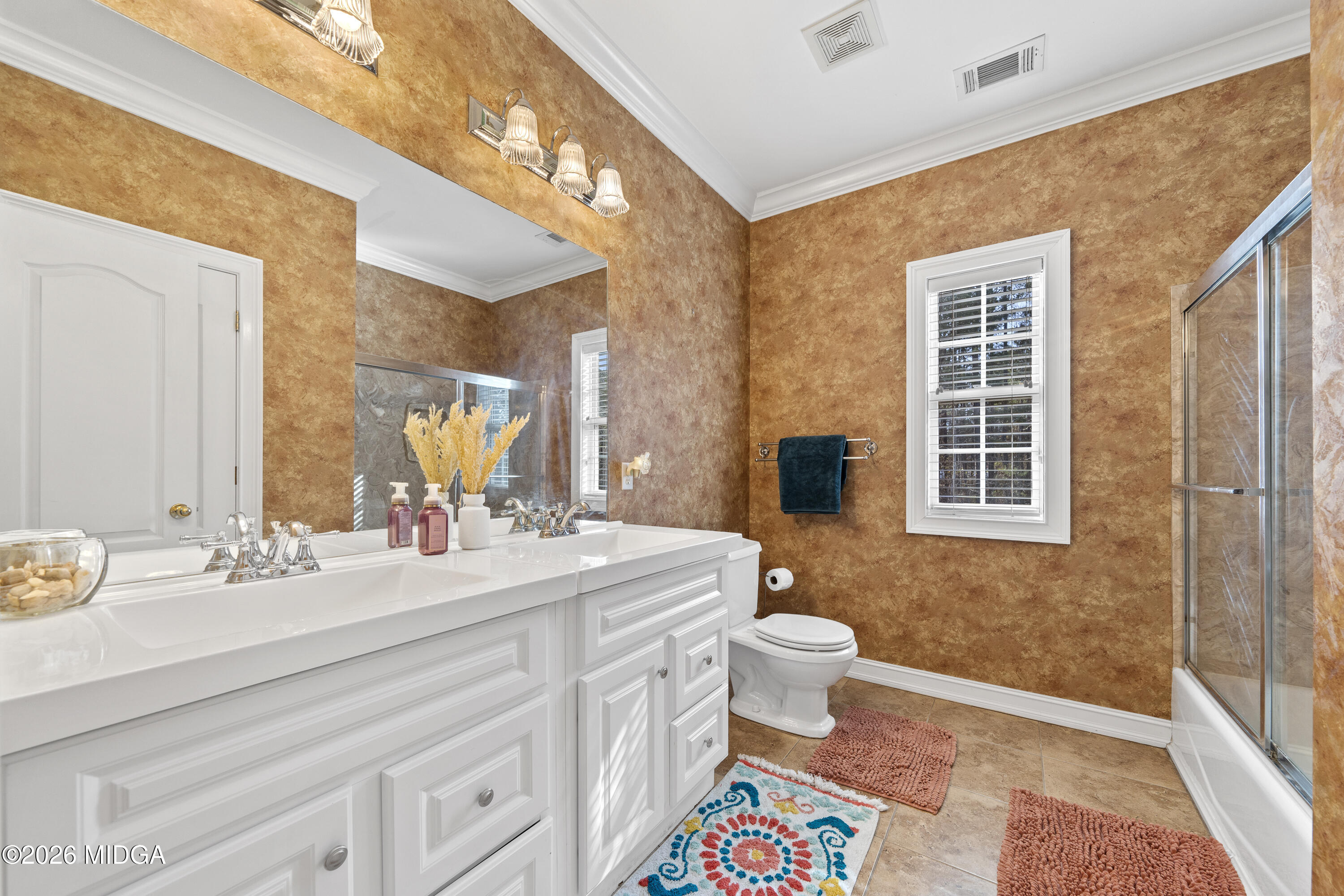 354 Lite-N-Tie Road Gray, GA 31032 - Photo 81 of 110 a bathroom with a sink a toilet and a mirror