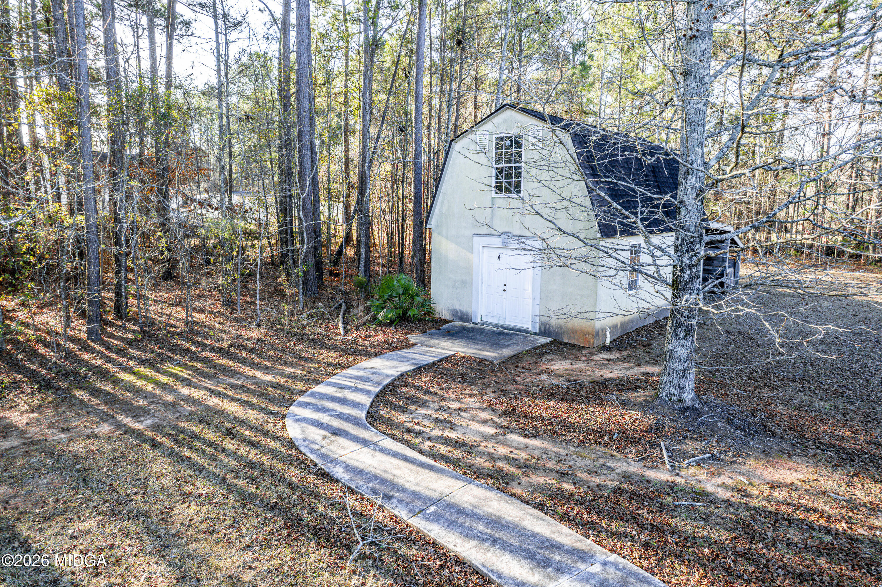 354 Lite-N-Tie Road Gray, GA 31032 - Photo 88 of 110 a view of a yard in front of the house