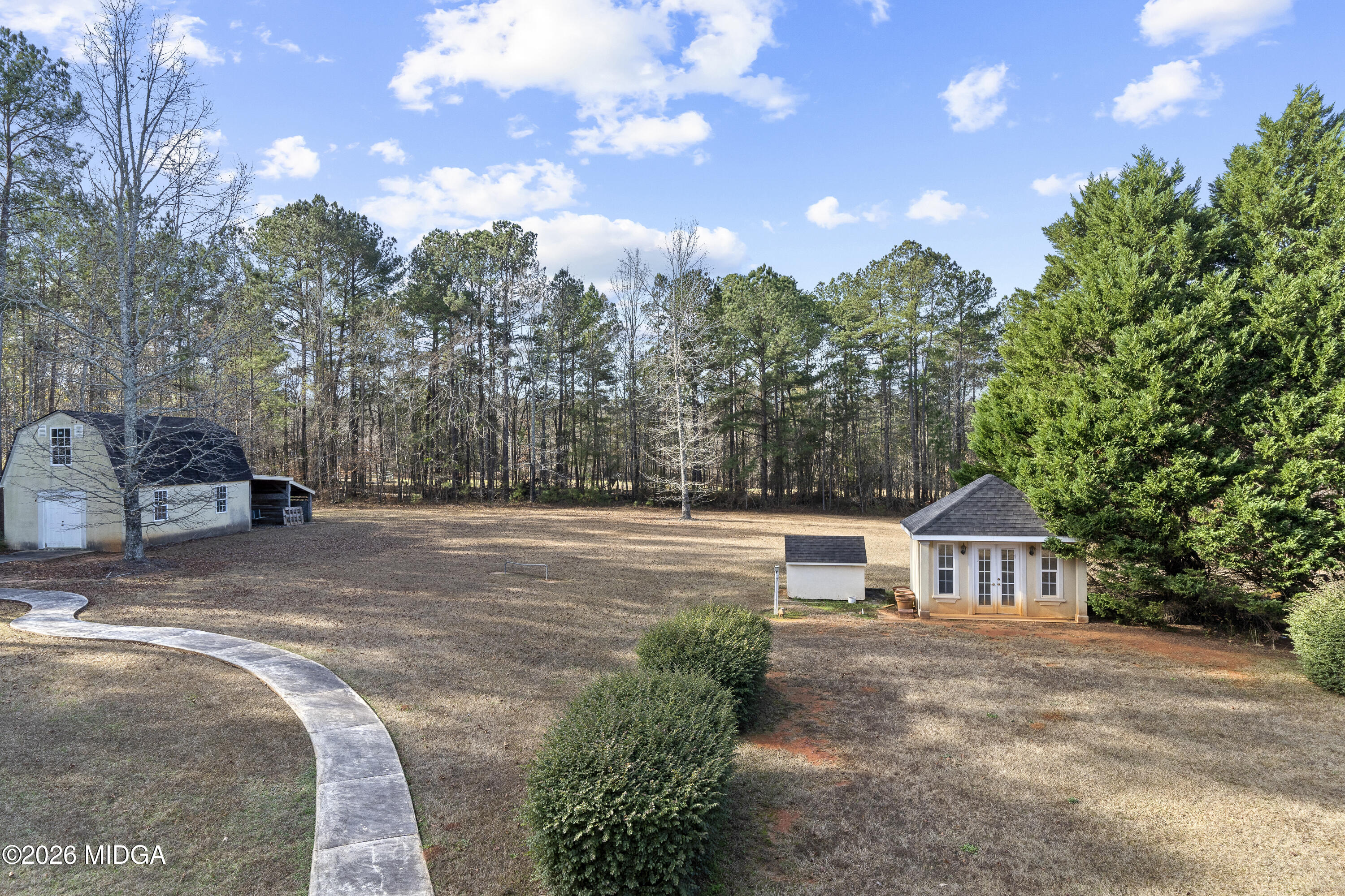 354 Lite-N-Tie Road Gray, GA 31032 - Photo 90 of 110 a view of house with outdoor space and tree in the background