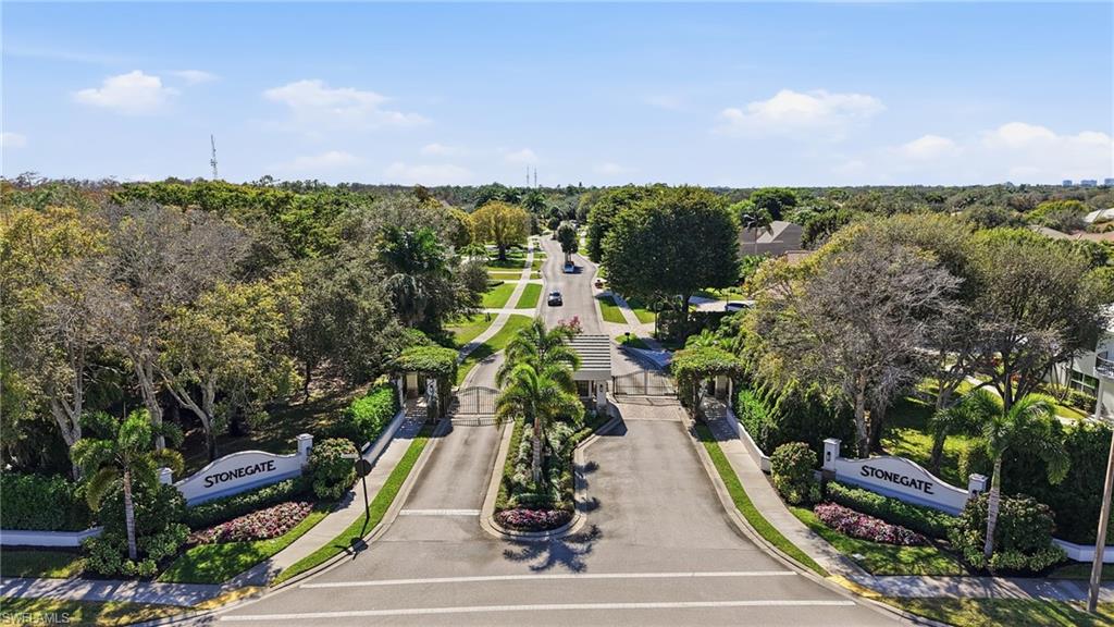 7395 Stonegate Drive Naples, FL 34109 - Photo 5 of 45 a view of a yard with plants