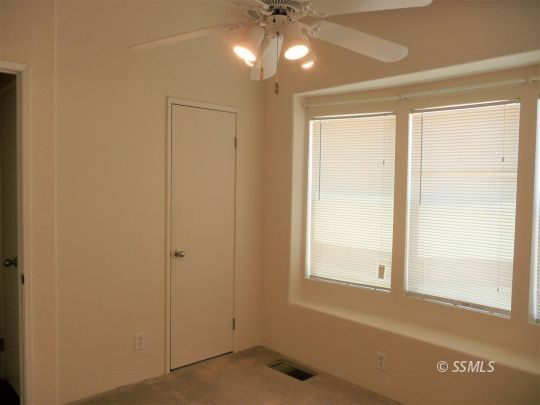 770 Alpine Way Ridgecrest, CA 93555 - Photo 40 of 50 a view of an empty room with a window