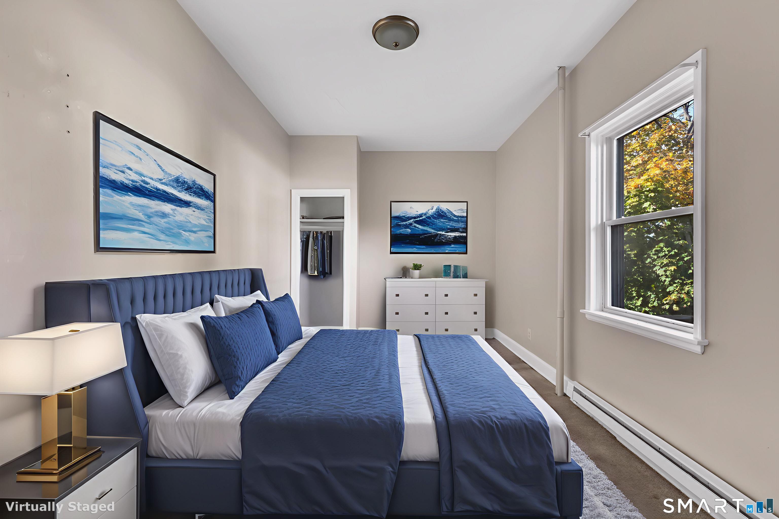 82-86 Water Street, Unit 2 Torrington, CT 06790 - Photo 3 of 23 a bed room with a bed furniture and a window