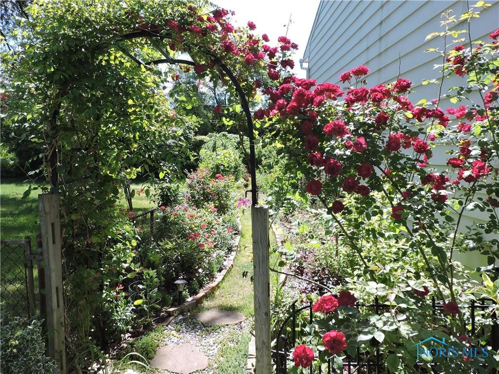 4558 Longfellow Road Sylvania, OH 43560 - Photo 15 of 20 Tranquil Walkway To Backyard Oasis!