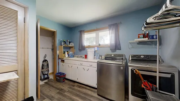 a kitchen with a stove and a refrigerator