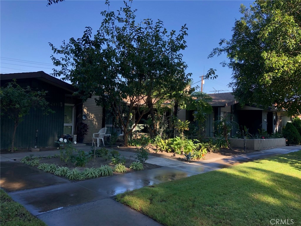 1851 Glenoaks Avenue, Unit C Anaheim, CA 92801 - Photo 3 of 21 a view of a house with a yard and tree s