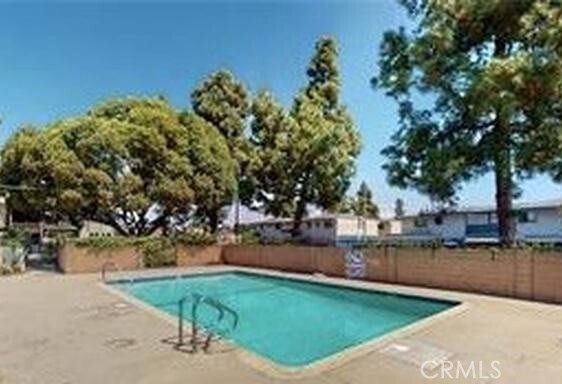 1851 Glenoaks Avenue, Unit C Anaheim, CA 92801 - Photo 4 of 21 a view of a lake with houses