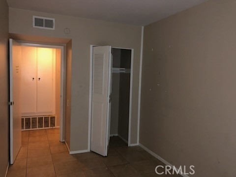 1851 Glenoaks Avenue, Unit C Anaheim, CA 92801 - Photo 10 of 21 a view of a hallway with some storage area