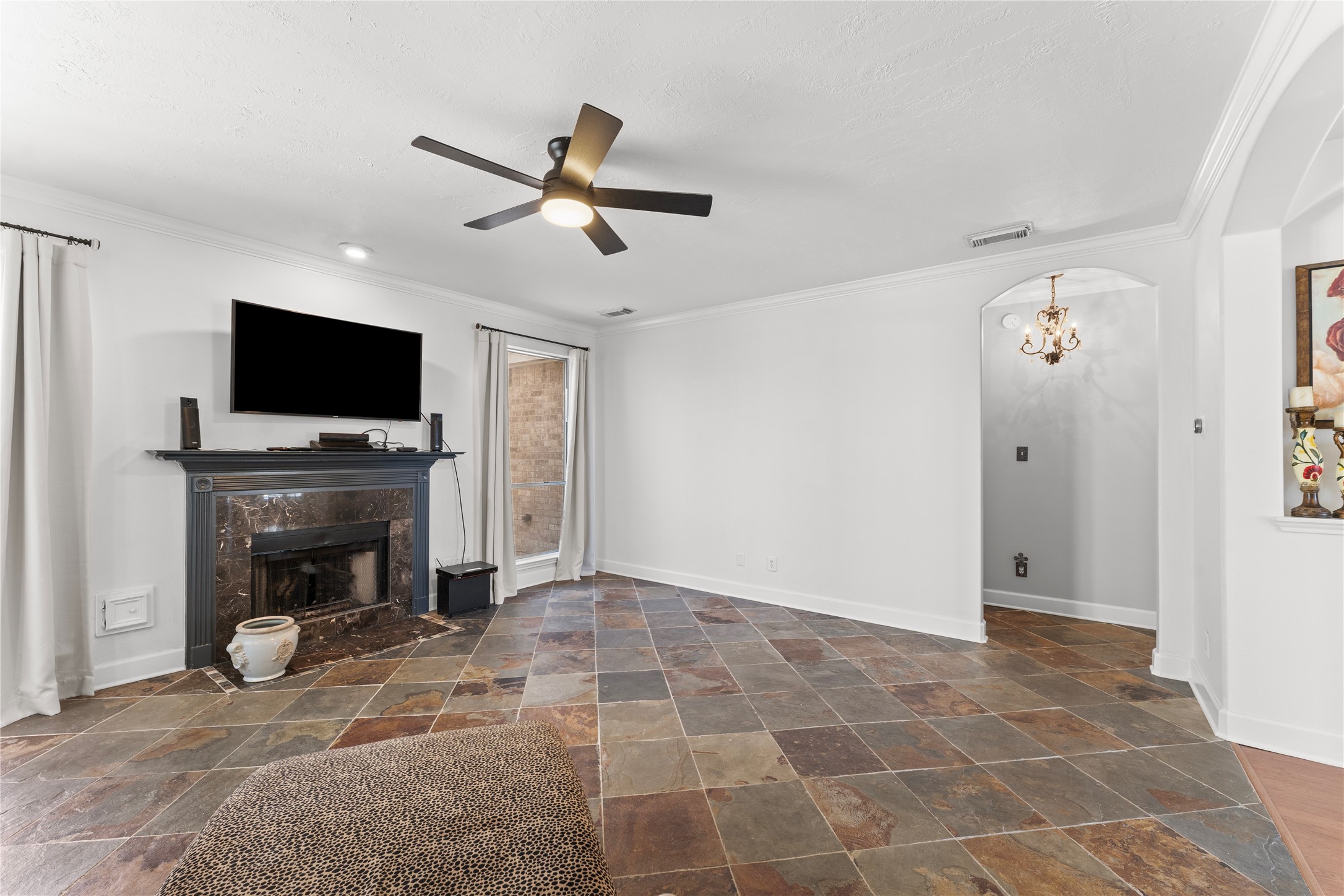 2922 Travick Lane Houston, TX 77073 - Photo 11 of 49 a living room with furniture and a flat screen tv