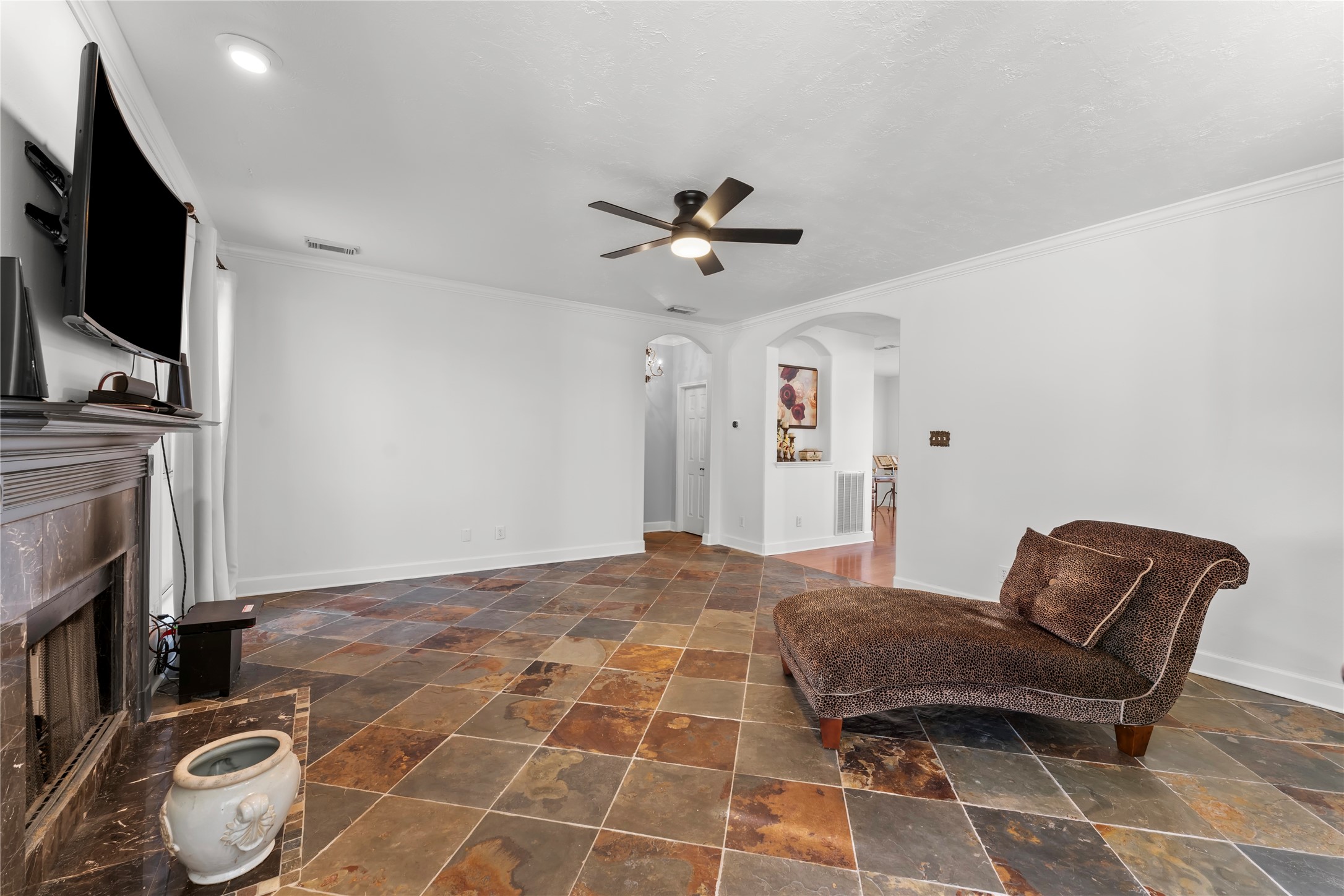 2922 Travick Lane Houston, TX 77073 - Photo 12 of 49 a bedroom with a bed and a flat screen tv