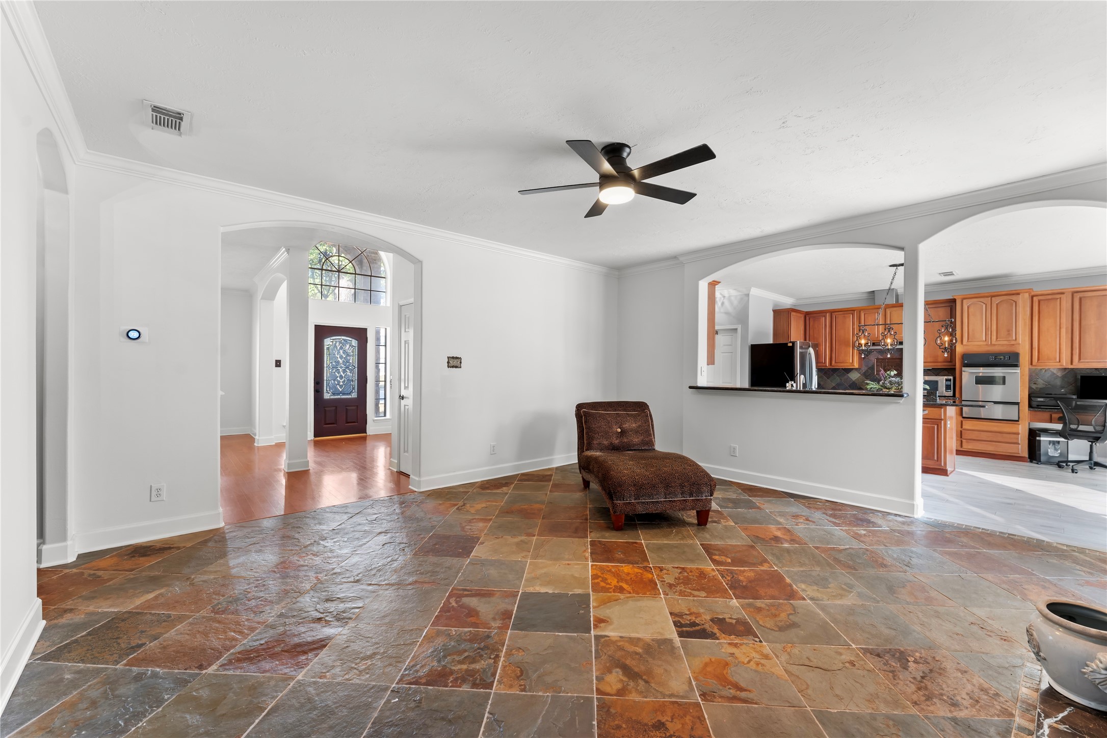 2922 Travick Lane Houston, TX 77073 - Photo 13 of 49 a living room with furniture a dining table and white appliances