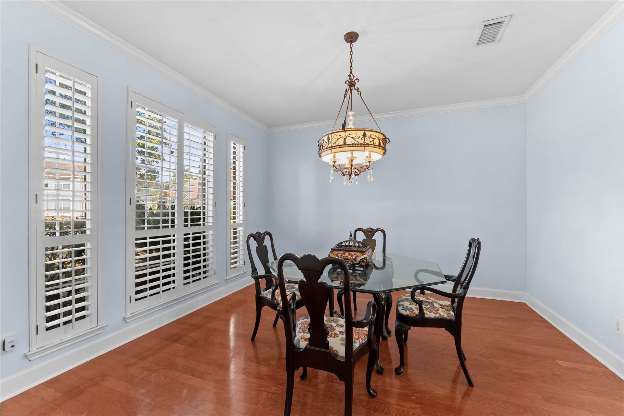 2922 Travick Lane Houston, TX 77073 - Photo 21 of 49 a view of a dining room with furniture wooden floor and chandelier