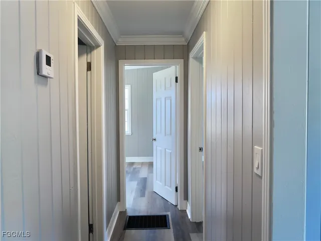a view of a bathroom from the hallway