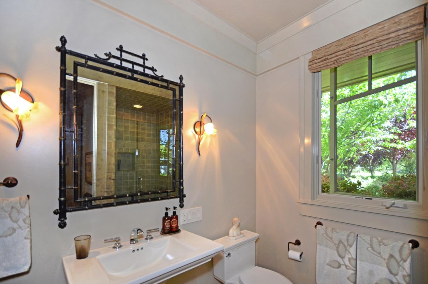 120 Edenvale Road Watsonville, CA 95076 - Photo 11 of 41 a bathroom with a sink mirror vanity and a toilet
