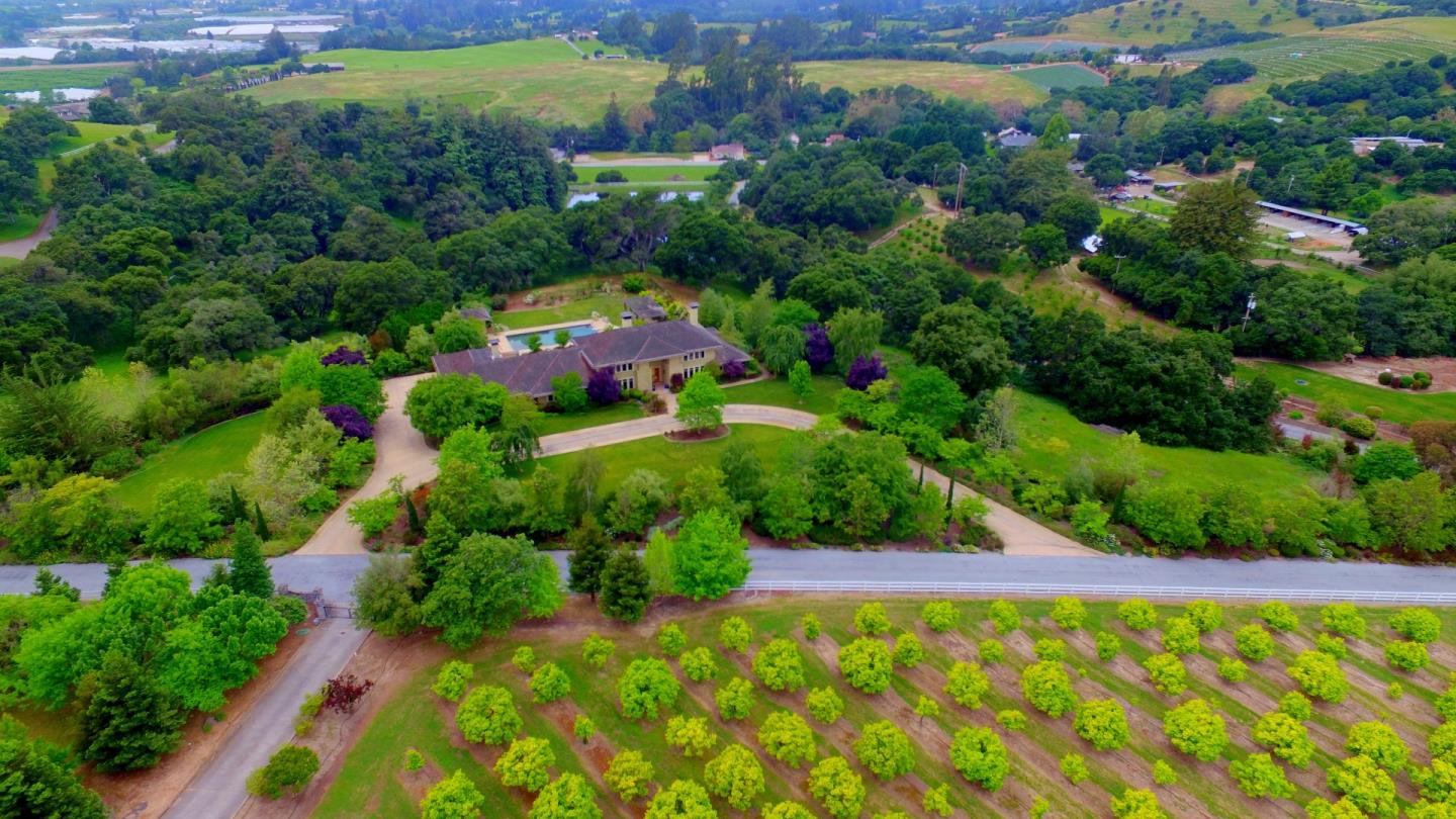 120 Edenvale Road Watsonville, CA 95076 - Photo 18 of 41 a view of a garden with plants and large trees
