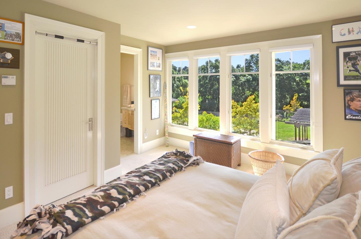 120 Edenvale Road Watsonville, CA 95076 - Photo 21 of 41 a bedroom with a large bed and a large window with the outer view